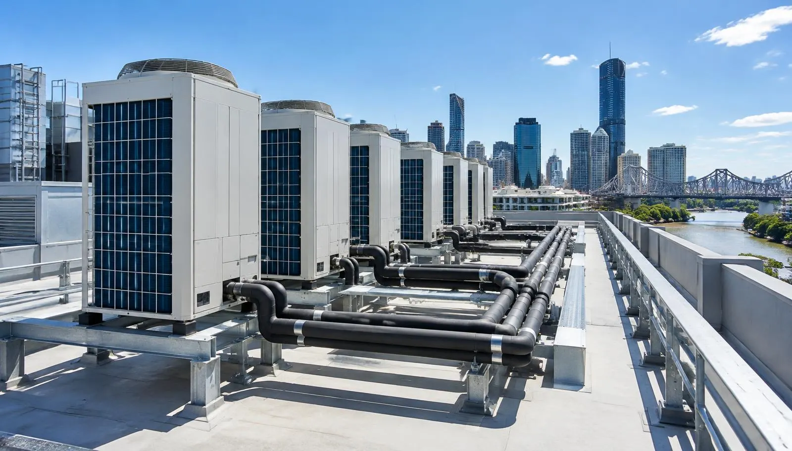 Rooftop VRF commercial air conditioning condensers on a Brisbane office building