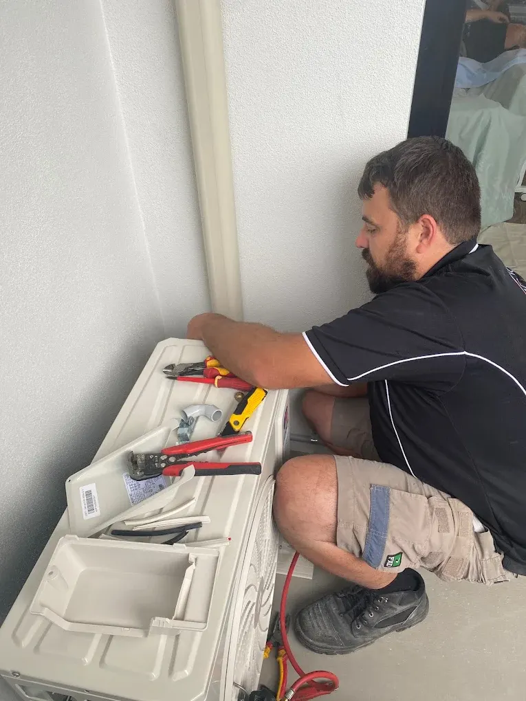 Split system head unit installed above a doorway in a Moreton Bay home