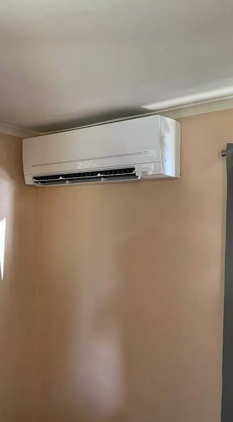 Cool room evaporator fan unit mounted inside a Brisbane commercial kitchen