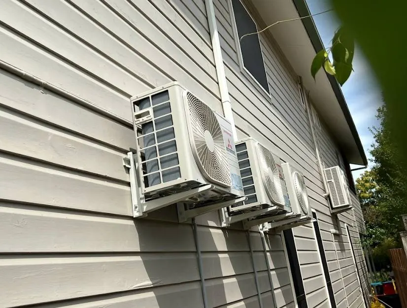 Ducted air conditioning indoor fan coil unit installed in a Brisbane roof cavity