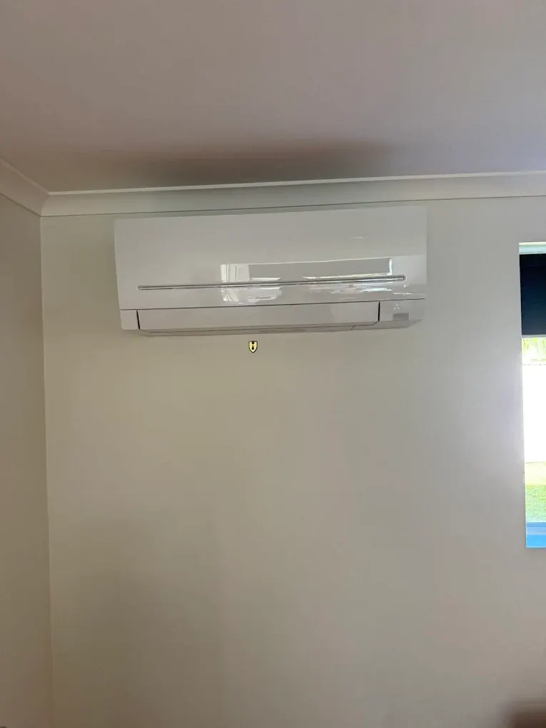 Split system air conditioner installation in a Brisbane living area
